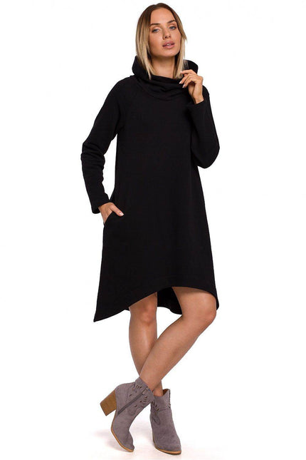 Moe asymmetrical cowl neck dress in black with side pockets and a stylish silhouette