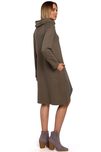 Moe asymmetrical cowl neck dress in olive green with long sleeves and pockets