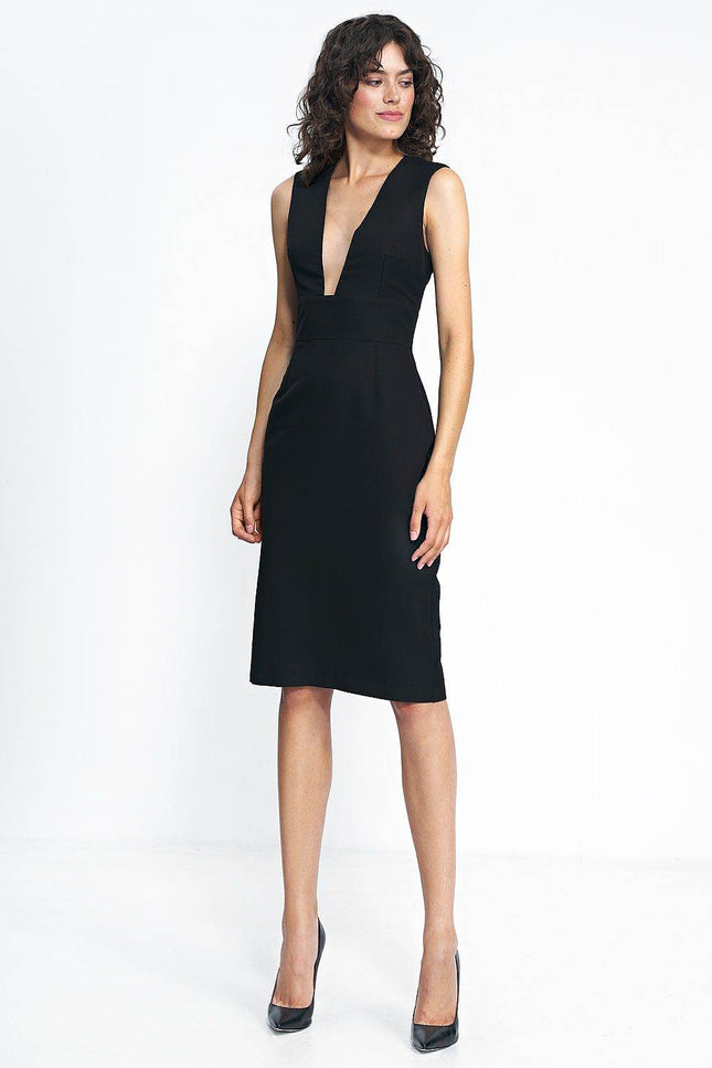 Cymbeline black dress with a plunging neckline and fitted silhouette, perfect for elegant occasions