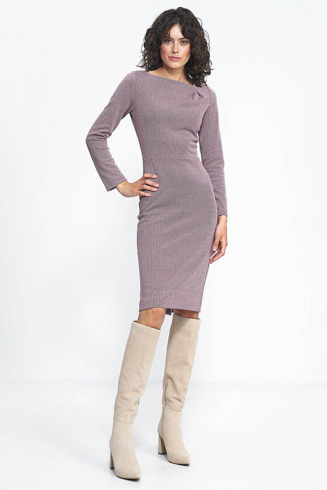 Stylish model wearing an elegant herringbone midi dress paired with knee-high beige boots