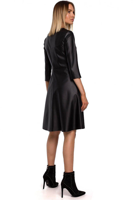 Moe faux leather A-line dress with a flattering silhouette and 3/4 sleeves, perfect for stylish outings