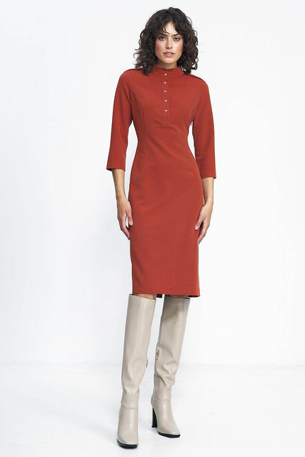Nife placket dress in rust color with three-quarter sleeves and button detail for a stylish look