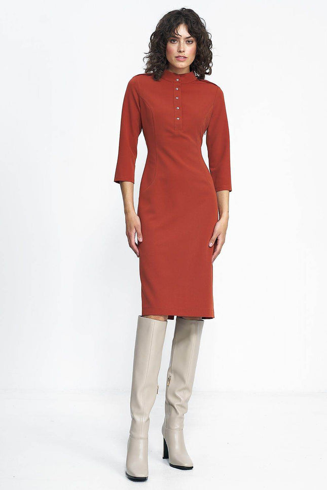 Nife placket dress in rust color with three-quarter sleeves and button detail for a stylish look