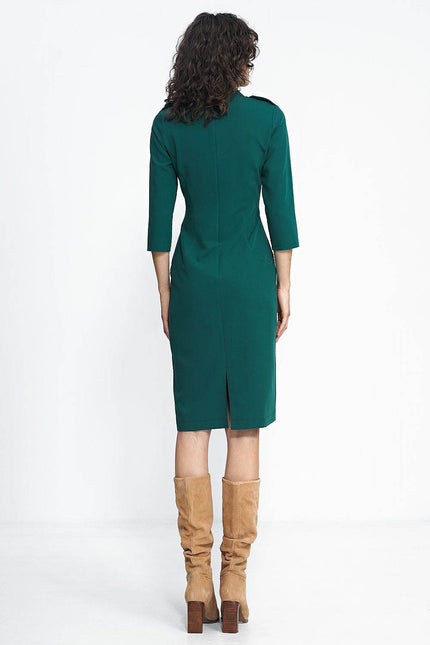 Nife placket dress in green with a fitted silhouette and back slit for elegant styling
