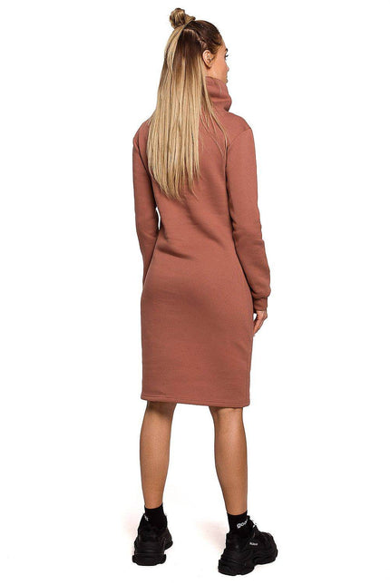 Back view of Moe ultra comfy knit dress in a soft pink color, perfect for casual wear